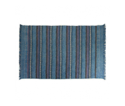 blue and red printed rug with fringe 