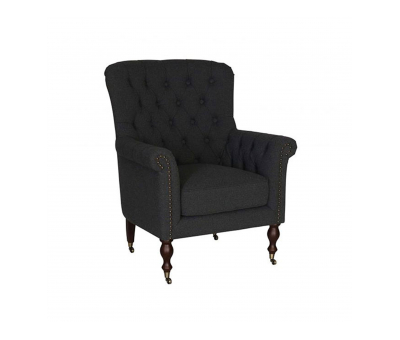 upholstered armchair with deep button detail and castors