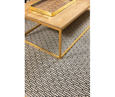 Block & Chisel stone coloured wool rug with black pattern detail