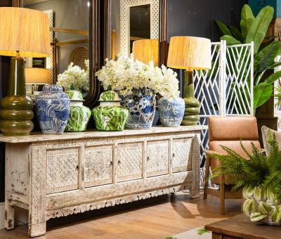 Large sideboard with distressed finish carving detail