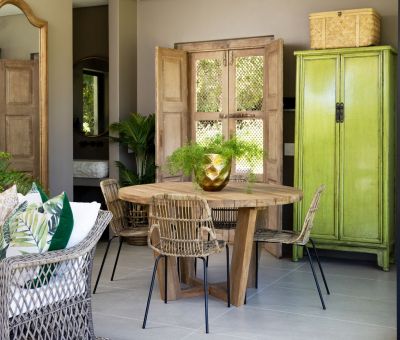 Block & Chisel round recycled teak dining table