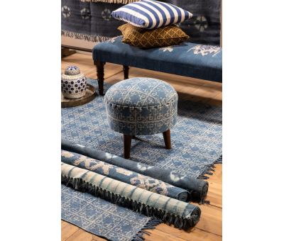 blue cotton rug with flower detail