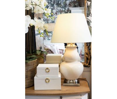 beige lamp with ceramic base and cone shape shade