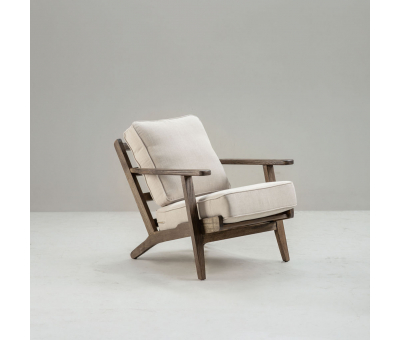Modern armchair, wooden frame with cream back and seat cushion