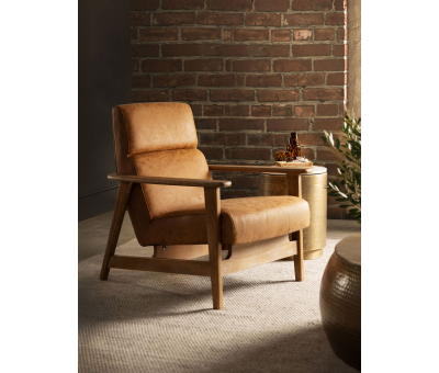 Low lounge chair in leather with wooden arms and legs