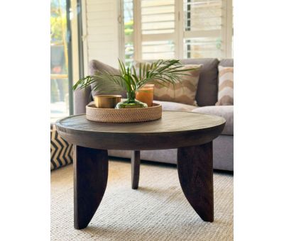 round wooden coffee table with 3 legs