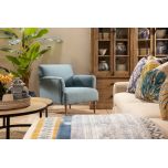Upholstered armchair with wooden legs teal