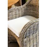 Block & chisel kubu rattan armchair with white seat cushion