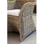 Block & chisel kubu rattan armchair with white seat cushion