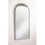 silver framed mirror with ornate top