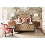 French style bed with deep button detail upholstered in linen