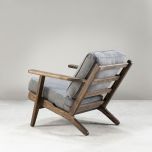 Modern armchair, wooden frame with light grey back and seat cushion