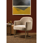 modern armchair in stone with brushed bronze metal base 