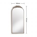 silver framed mirror with ornate top