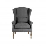 upholstered wingback with turned wooden legs