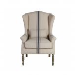 upholstered wingback with turned wooden legs