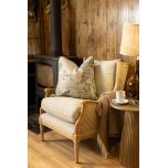 French style wingback chair with rattan detail 