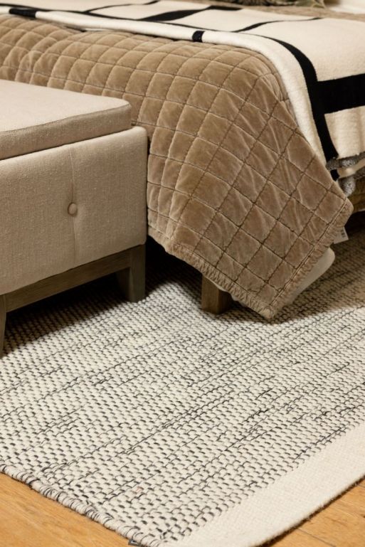 Block & Chisel white/black wool rug with white trim