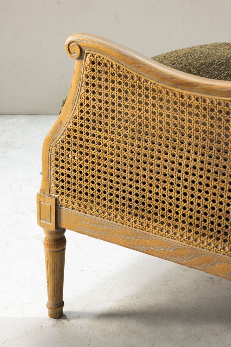 French style wingback chair with rattan detail 