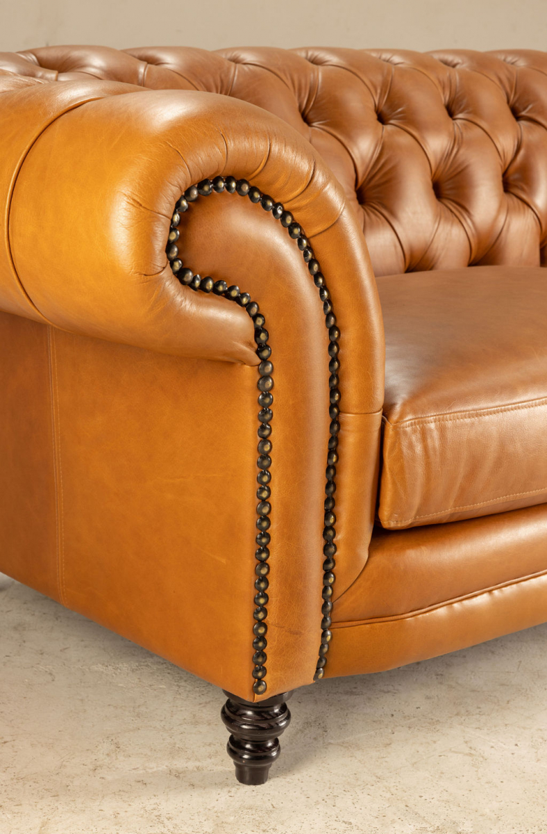 Block and chisel leather chesterfield sofa