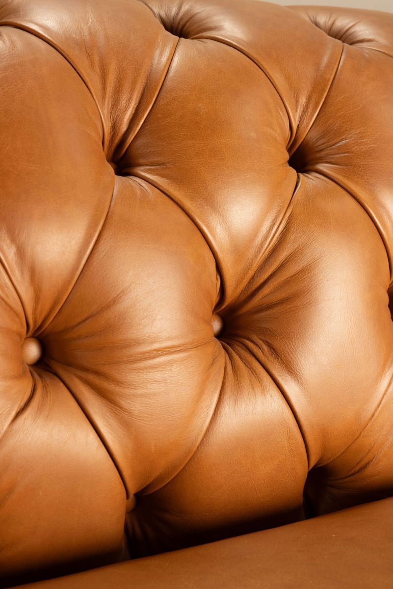 Block and chisel leather chesterfield sofa