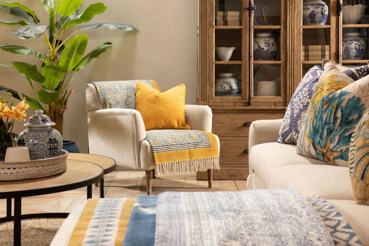 Upholstered armchair with wooden legs linen