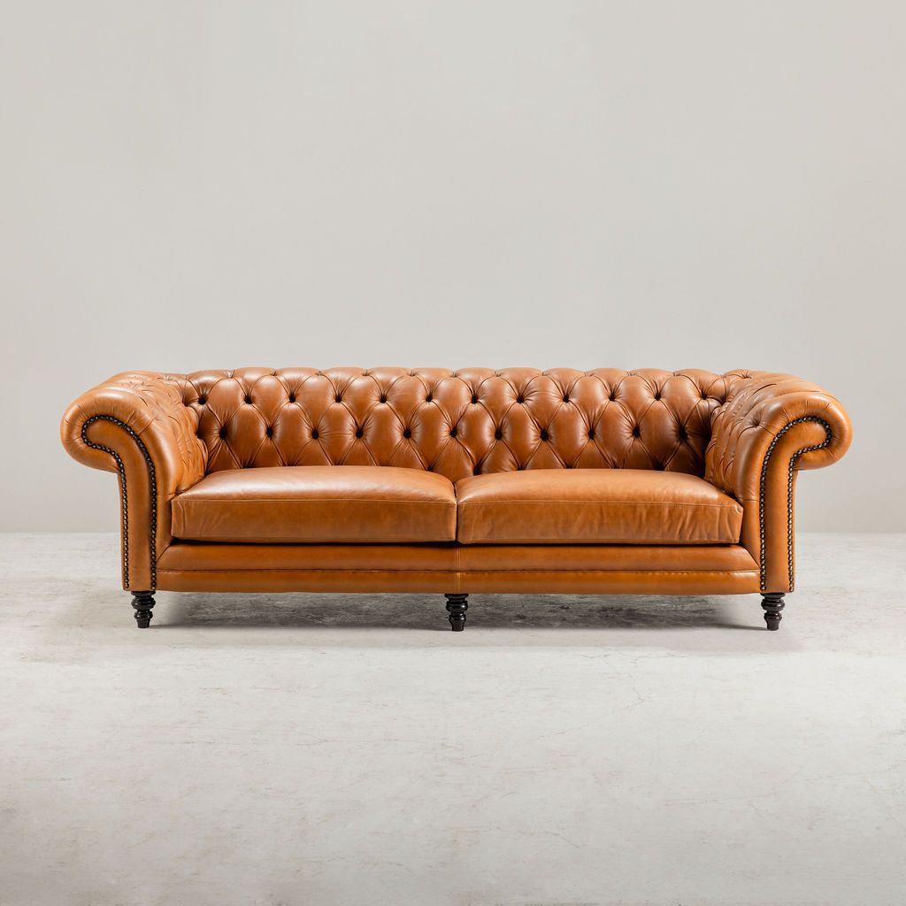 Block and chisel leather chesterfield sofa