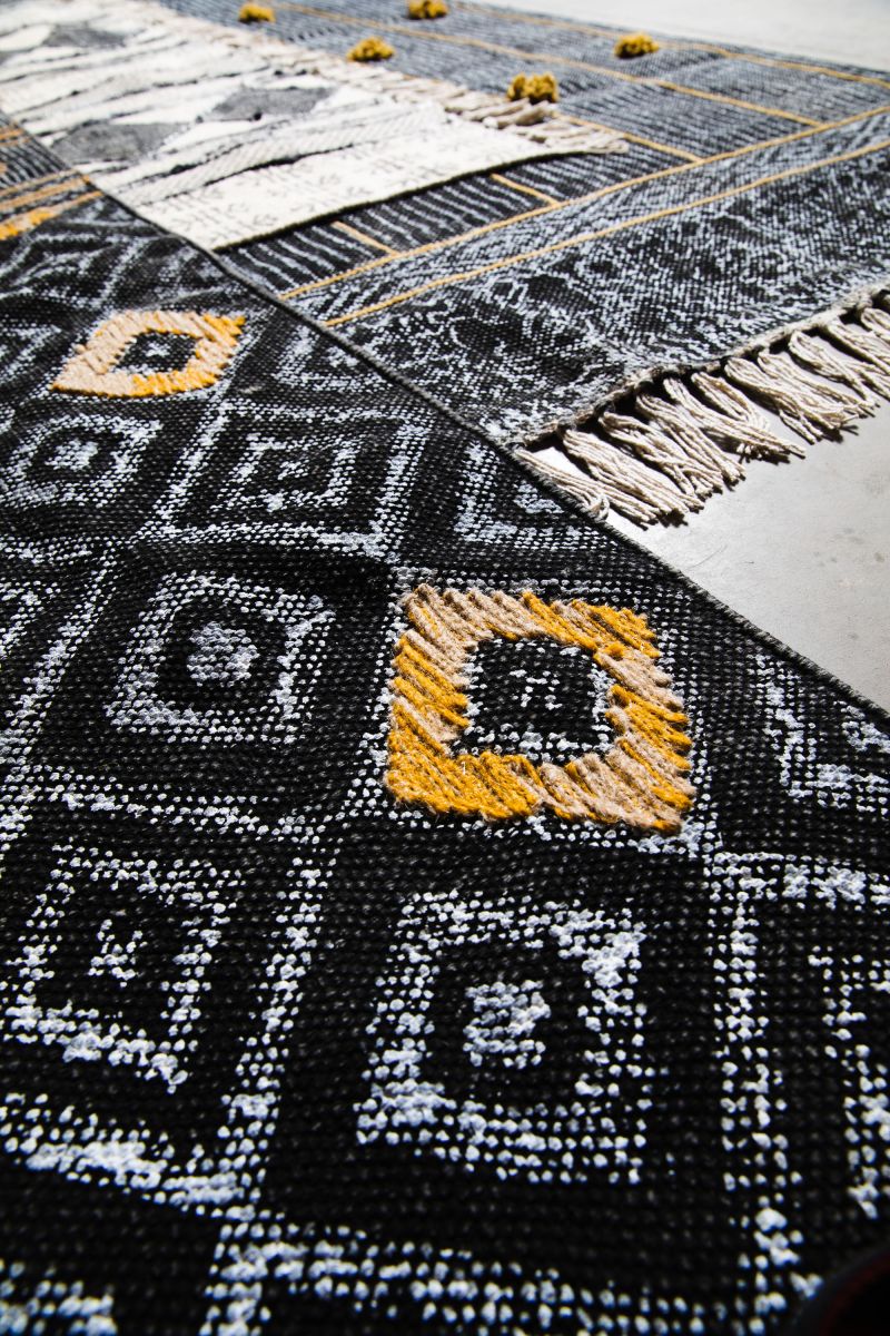 Indus rug in black with mustard diamond 