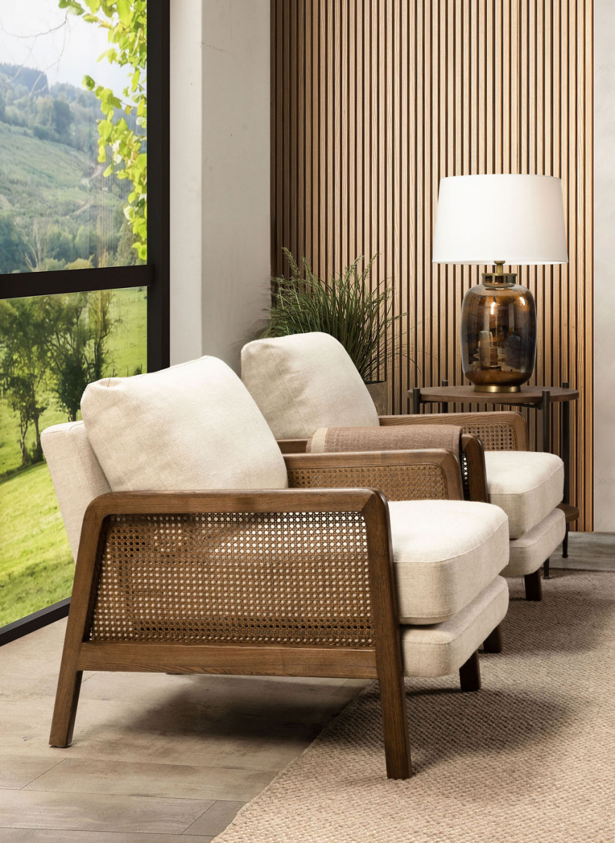 Modern armchair in cream with rattan inlay on arms