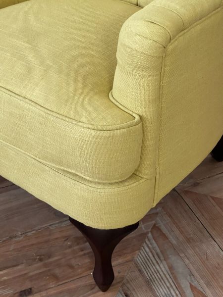 Armchair with deep buttoned detail and queen anne legs